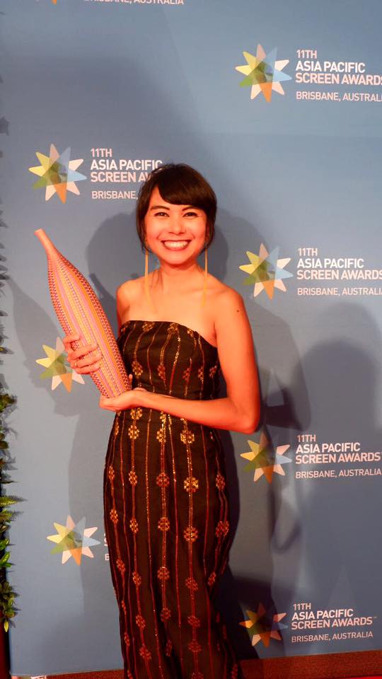 Dini with her award at APSA 2017